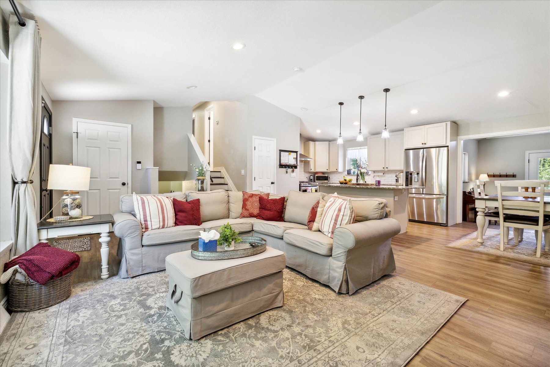 Open living room and kitchen with a sectional sofa