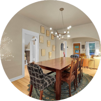 Dining room with a wood table and chandelier