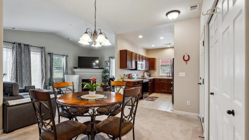 Dining area and kitchen in a ranch-style townhome at Aspen Meadows